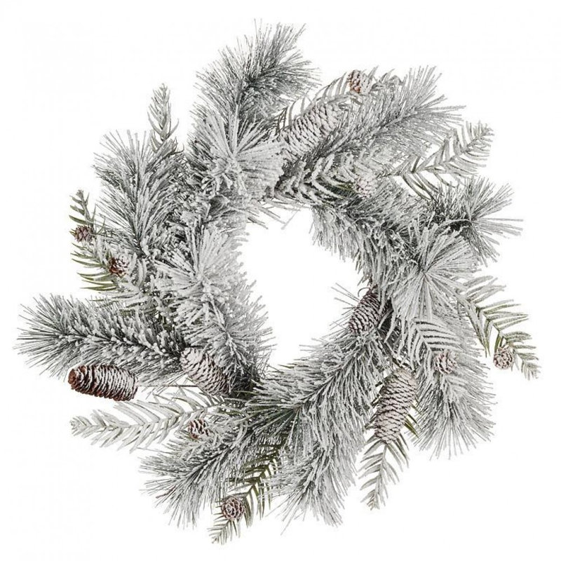 Grande couronne de pin enneigé et pomme de pin