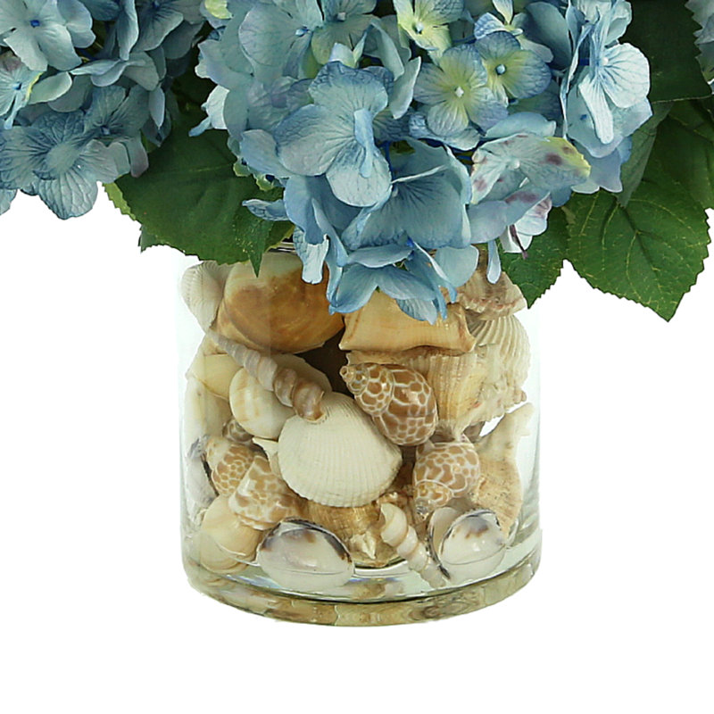Hydrangeas Arranged in Glass Vase with Shells, Blue/Beige