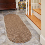 Elsner Handmade Braided Indoor / Outdoor Area Rug in Brown