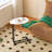 C-shaped side table in white, modern wood top with metal frame design for sofa and bedside placement-114039279