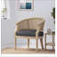 Chaise d'appoint avec structure en bois d'hévéa et revêtement gris anthracite, combinant élégance rétro et confort pour n'importe quelle pièce