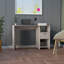 Bureau d'ordinateur avec 1 tiroir et 2 tablettes de rangement ouvertes, gris clair