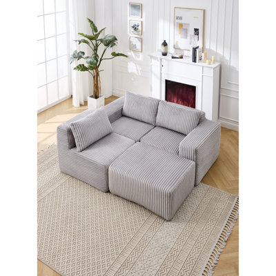 Canapé modulaire moderne en L avec coussins profonds