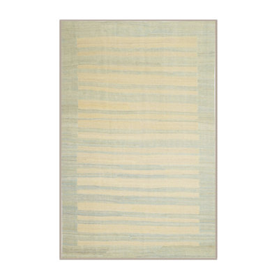 Surface beige contemporaine tapis