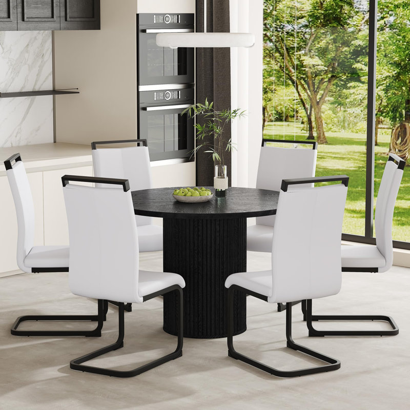 Ensemble de table de salle à manger 7 pièces comprenant un plateau en bois noir et une base cylindrique. Ensemble de table de salle à manger 42 po pour 6 personnes alliant stabilité, confort et style contemporain.
