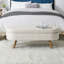 Banc de rangement ovale beige avec pieds en bois d'hévéa fiables - ajoute une touche de classe