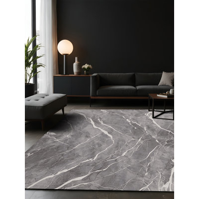 Tapis gris soyeux et moelleux