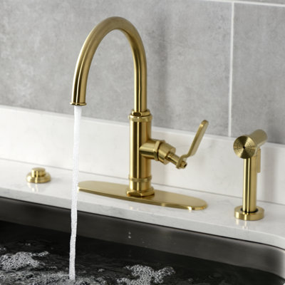 Kingston Brass Whitaker Single-Handle Deck Mount Kitchen Faucet with Brass Sprayer