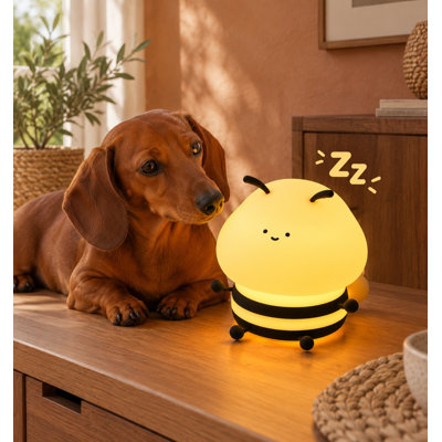 A squishy bee theme gives this rechargeable LED children's nightlight a playful look, while adjustable nursery lighting, touch control, and a timer suit kids' spaces, dorm decor, or an amusing gift (Bee).