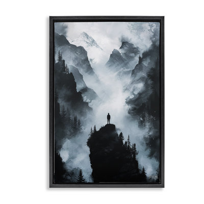 Man on Intense Cliff Black Framed Floater Canvas by RB