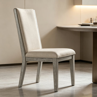 Chaise d'appoint à dossier haut en tissu beige de luxe