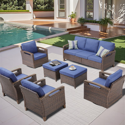 Ensemble de mobilier d'extérieur 7 pièces de qualité supérieure, canapé en rotin spacieux, 2 chaises berçantes pivotantes, 2 chaises de patio et 2 repose-pieds polyvalents, collection en osier PE toutes saisons pour patio, jardin, cour et bord de piscine