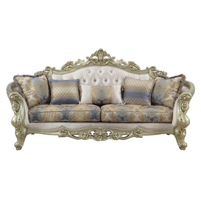 Gracie Mills 40" Antiqued White Velvet Curved Floral Sofa And Toss Pillows With Champagne Legs