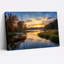 Impression sur toile, voilier en bois sur un lac doré au coucher du soleil-133055187