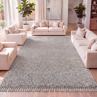 Tapis gris à poil long et pampilles Felicdad