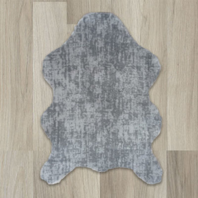 Tapis gris clair novateur tissé à la machine à motif abstrait Numa