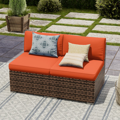 2 Piece Rattan Sectional Seating Group With Cushions