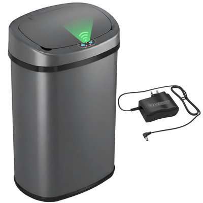 Stainless steel 13-gallon touchless kitchen trash can with oval shape, sensor-activated lid, and included AC power adapter.