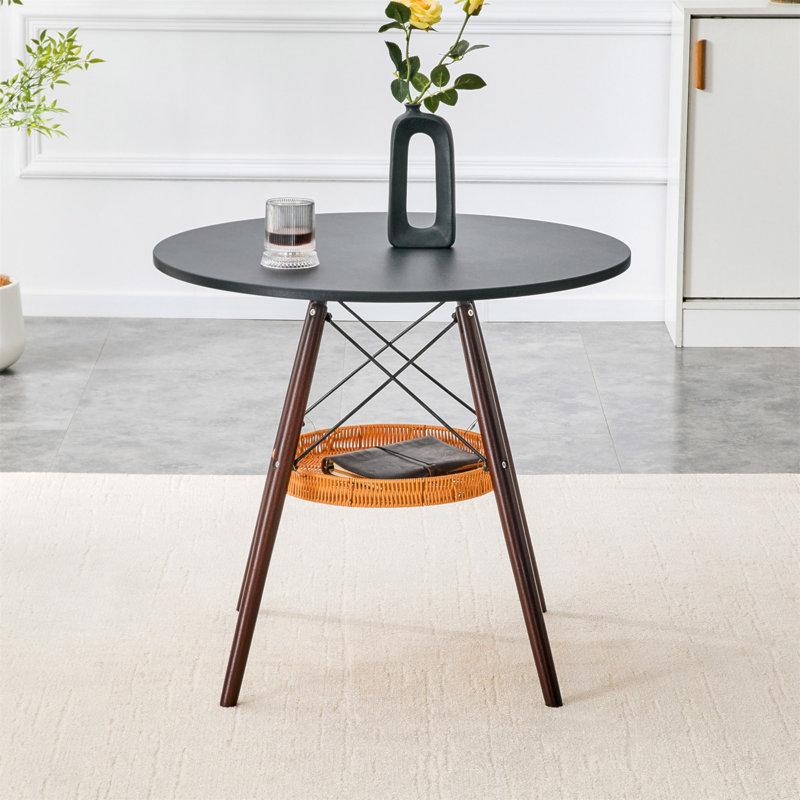 Table de salle à manger circulaire de 31,5 pouces de diamètre, plateau de table en panneau de fibres à densité moyenne, pieds en bois massif de noyer, avec structure de panier de rangement tissé suspendu. Une table basse décontractée pouvant accueillir de 2 à 4 personnes.