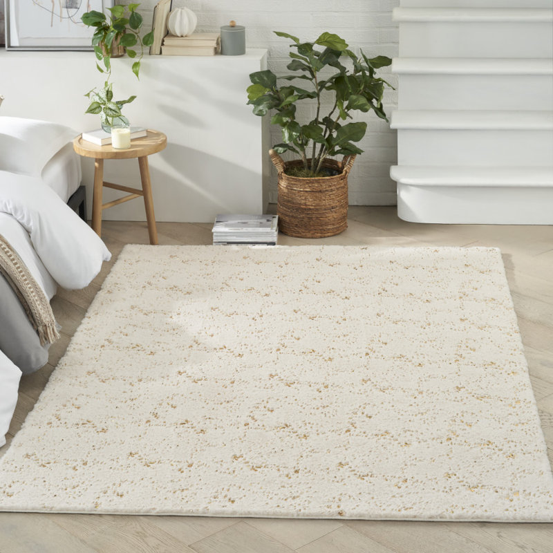 Tapis rectangulaire rectangulaire en polyester touffeté à la main ivoire / doré Williston, Rectangle 7 pi 9 po x 9 pi 9 po