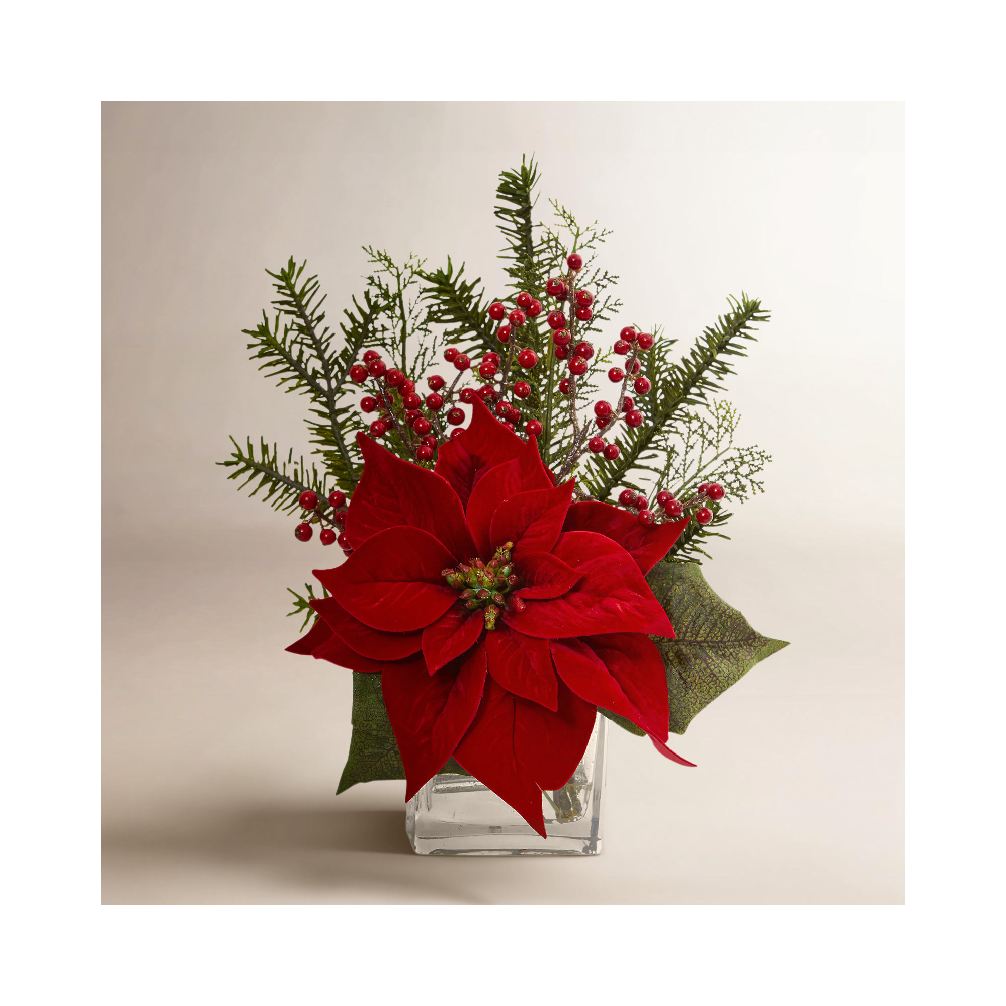 Poinsettia Pine and Berries Mixed Floral Arrangement in Vase