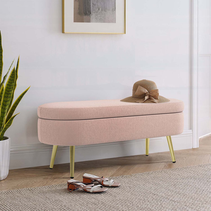 Banc de rangement repose-pieds ovale avec revêtement en flanelle et pieds en métal robustes, parfait pour les espaces de vie modernes et confortables