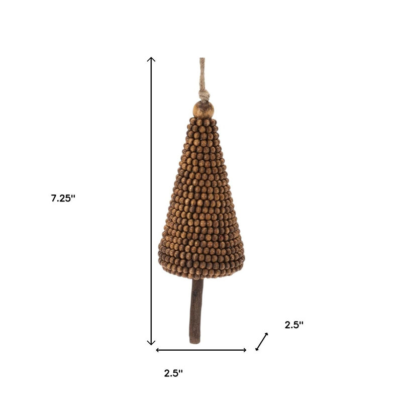 Ensemble de quatre décorations en forme d'arbre de Noël en bois brun