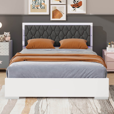 Grand lit tapissier avec éclairage à DEL d'ambiance