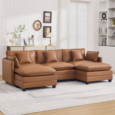 Canapé modulaire rembourré en similicuir avec repose-pieds