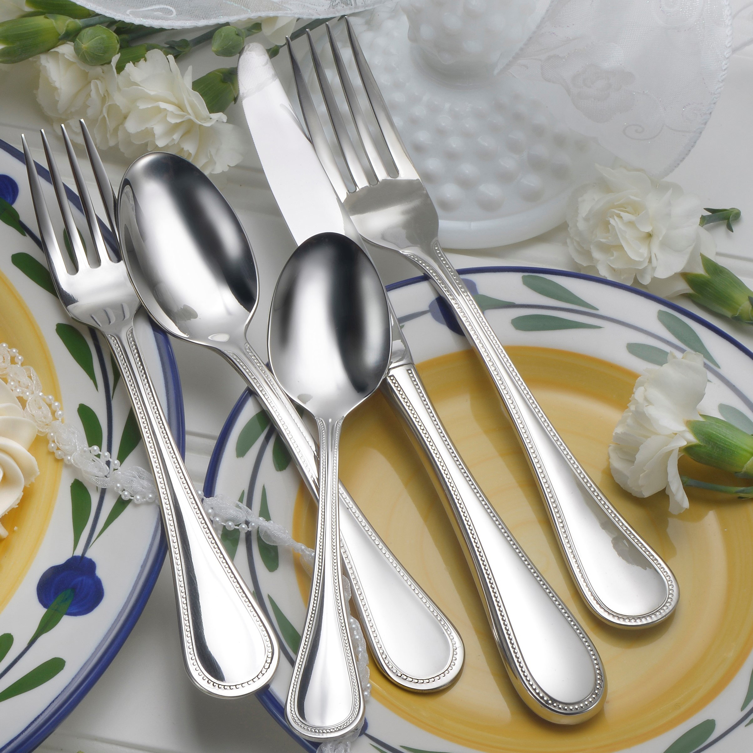 https://assets.wfcdn.com/im/83914839/compr-r85/2045/204581681/liberty-tabletop-pearl-stainless-steel-flatware-set-service-for-4.jpg