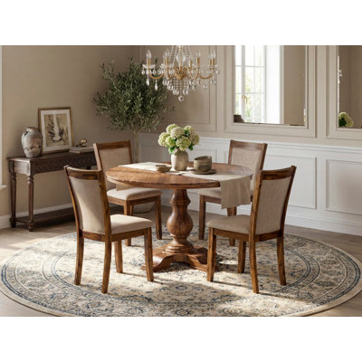 Cet ensemble de cuisine de 5 pièces comprend une table de salle à manger à piédestal et 4 chaises de salle à manger en tissu de lin brun clair avec dossier rembourré - Noyer antique