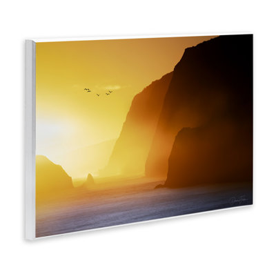 Art mural lumineux sur les falaises ensoleillées par Dennis Frates