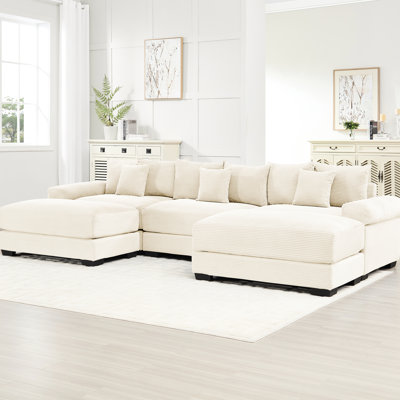 Canapé d'angle modulaire Cloud surdimensionné de 330 cm (130 pouces), 3 places, au design ergonomique, épais et modulable pour un confort optimal à la maison. Revêtement en velours côtelé crème. Conception d'espace de vie.