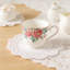 Service à thé en porcelaine tendre 15 pièces avec peinture florale élégante, comprenant théière, tasses, soucoupes, sucrier, pot à crème et cuillères pour le thé ou le café