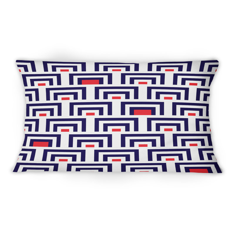 Coussin décoratif à motif géométrique bleu et rouge