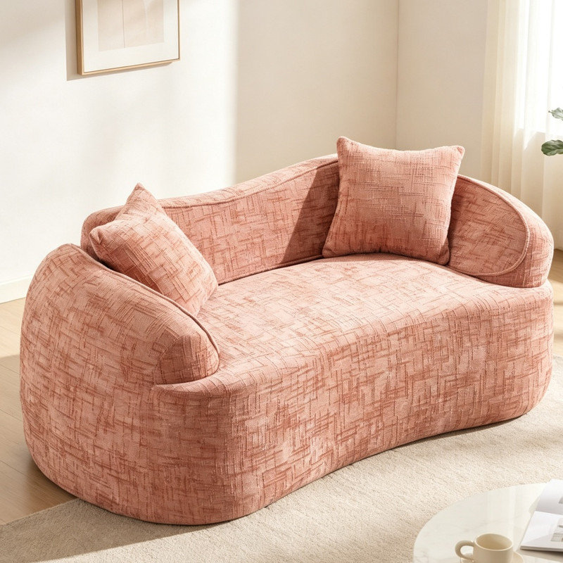 Canapé comprimé rose incurvé 2 places, causeuse compacte avec accoudoirs et 2 coussins décoratifs pour petit appartement, salon ou chambre