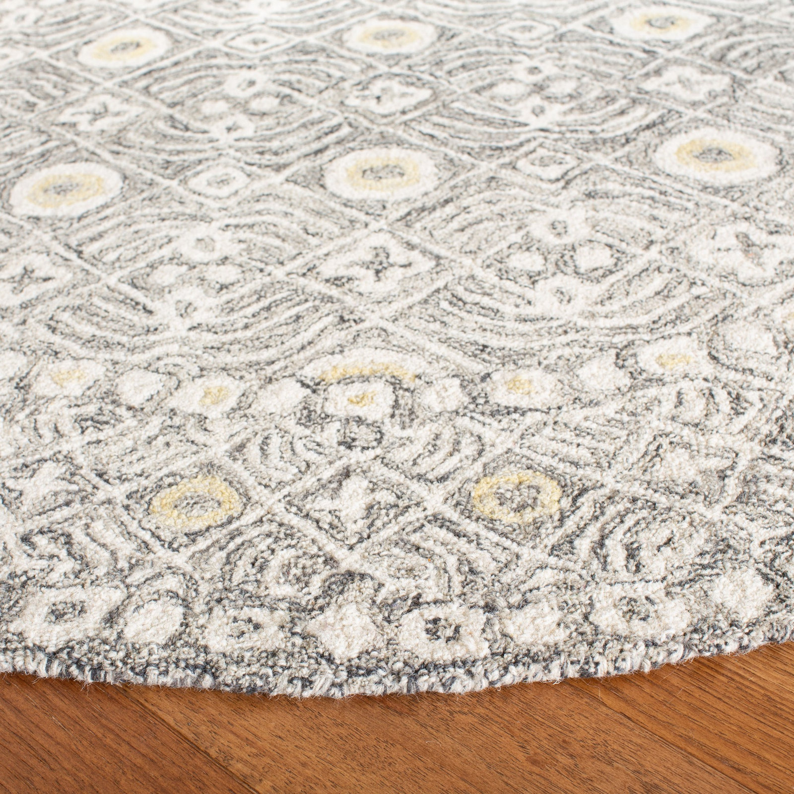 Stalder Ivory Hand-Tufted Wool Rug, Round 5'