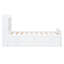 Lit simple blanc avec prises de tête de lit et grand espace de rangement avec décoration élégante