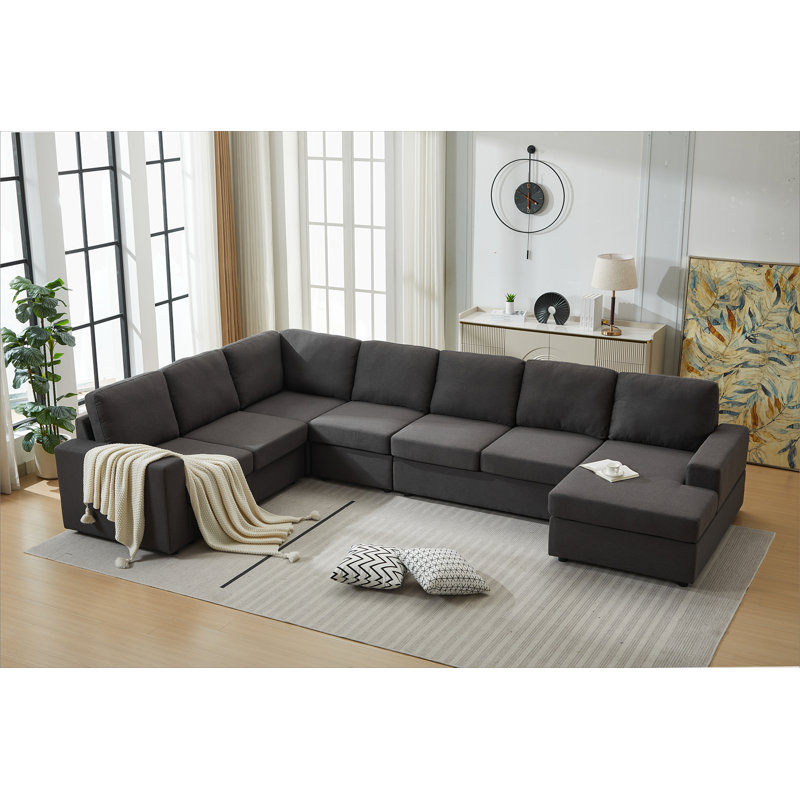 Grand ensemble de canapé modulaire en forme de L avec composants amovibles, revêtement confortable et jetés décoratifs pour les intérieurs contemporains