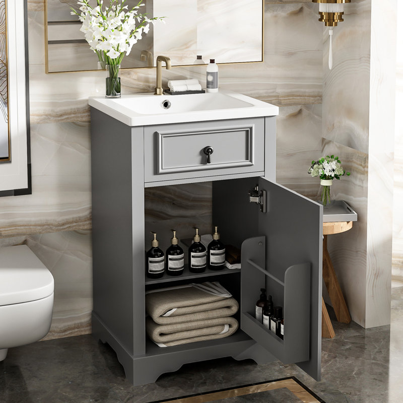 Meuble-lavabo de 20 pouces avec lavabo en céramique, porte à fermeture en douceur et poignée pour faciliter les petits travaux de rangement