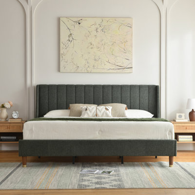 Linvel Upholstered Wingback Bed