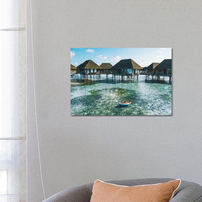 Maldives Resort Bungalows Girl Pool Float by James Vodicka - Wrapped Canvas Print