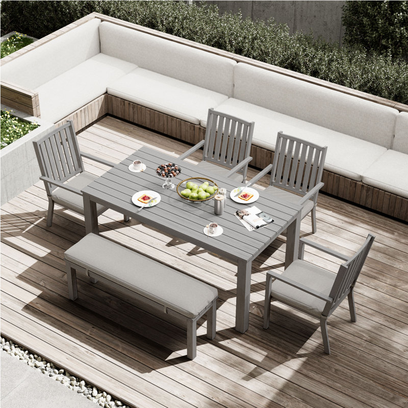 Deidre Aluminum 6 - Person Rectangular Outdoor Dining Set with Cushions, Gray