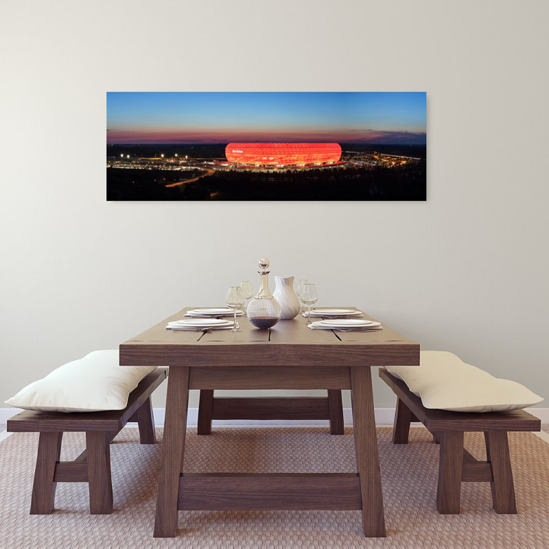 Soccer Stadium Lit Up At Dusk Allianz Arena Munich Bavaria Germany by Markus Lange - Wrapped Canvas Panoramic Print