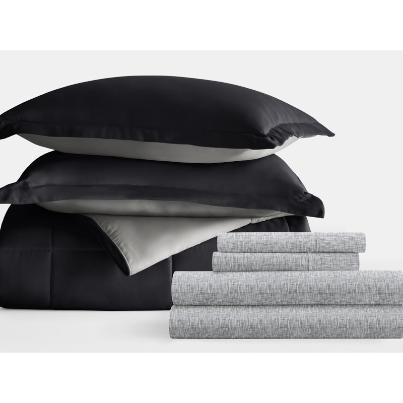 7-Piece Reversible Bedding Bundle - Solid Comforter and Patterned Sheet Set, King Comforter + 1 Additional Piece, Black