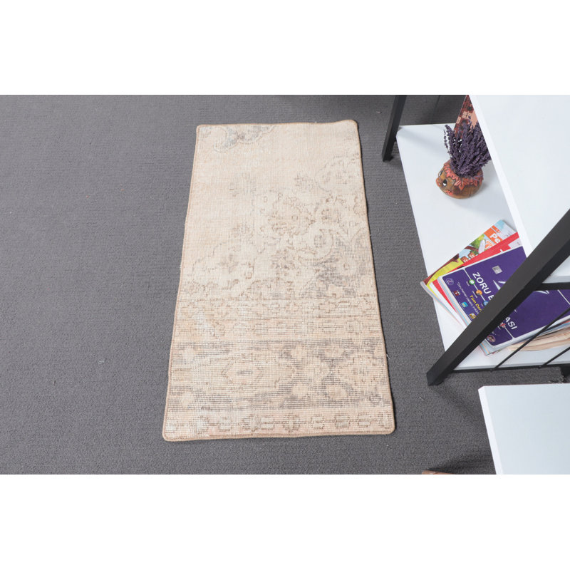 Small Beige Turkish Rug With Floral Design Perfect For Brightening Up Any Room