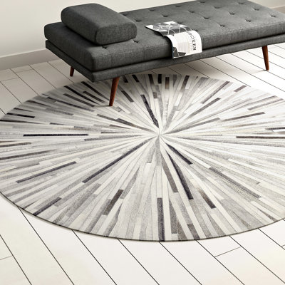 Zehner Cowhide Geometric Indoor Rug