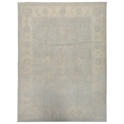 Tapis bleu et ivoire de haute qualité noué à la main