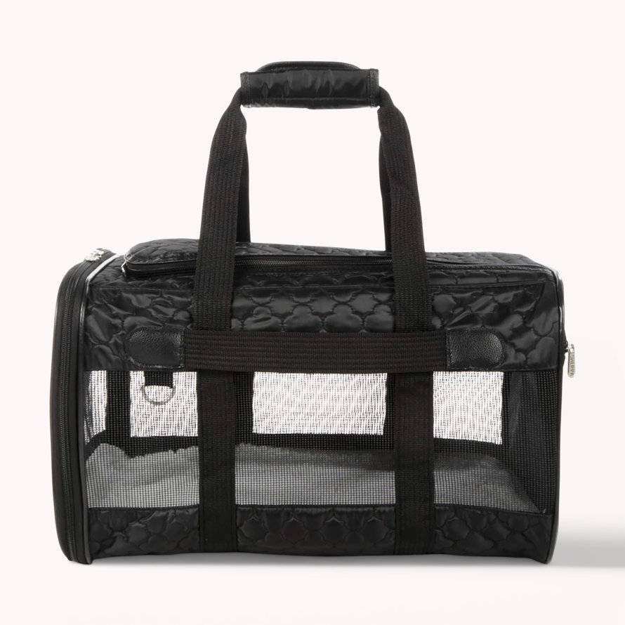 Black quilted Sherpa pet carrier with mesh windows.
