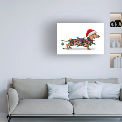 Wrapped Canvas Wall Art - John Hovenstine 'Christmas dachshund with lights' Wall Art for Living Room, Bedroom, or Office Décor  - 16x24